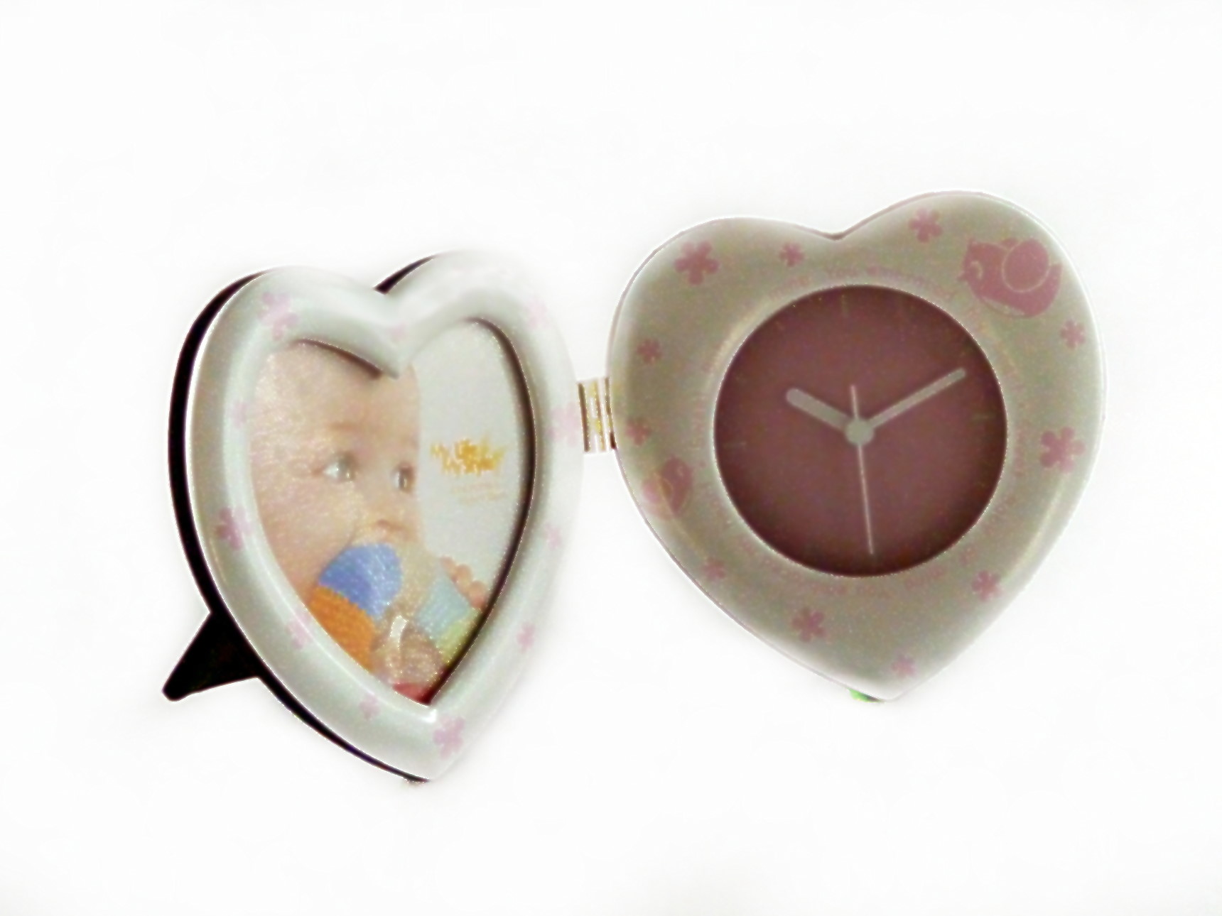 Uhr in Herzform mit Bilderrahmen